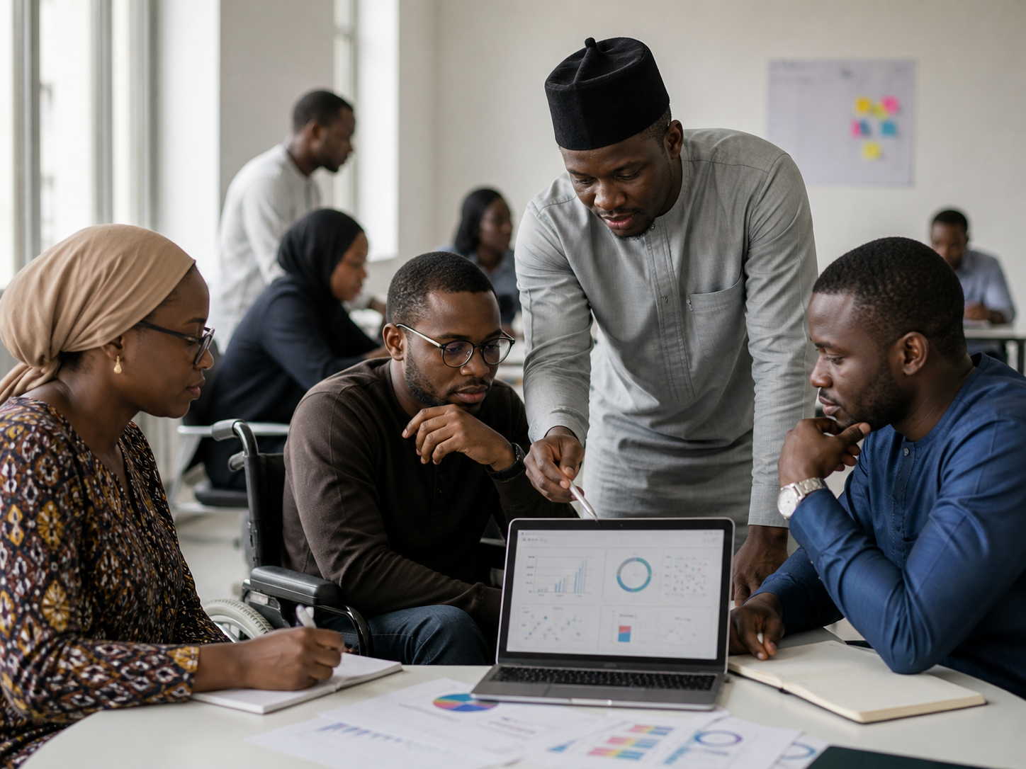 Nigerian professionals reviewing an inclusive artificial intelligence system